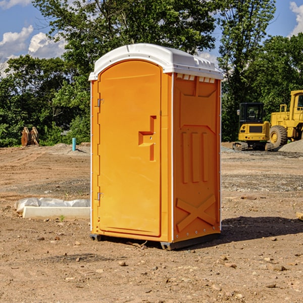 how often are the porta potties cleaned and serviced during a rental period in Roy